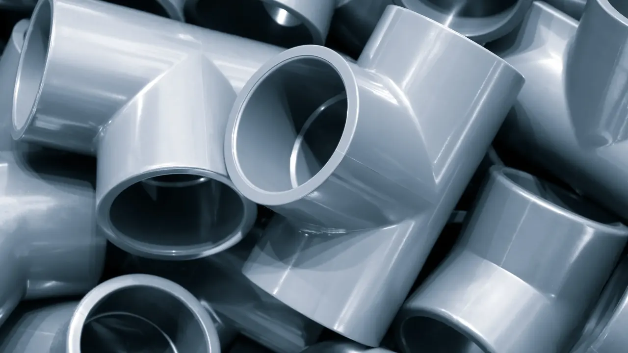 ACT Plastics fabrication facility with stacked acrylic, polycarbonate and HDPE sheets